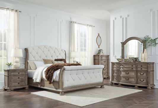 Ardenfield - 6 Pc. - Dresser, Mirror, Chest, California King Upholstered Sleigh Bed, 2 Nightstands - Light Brown