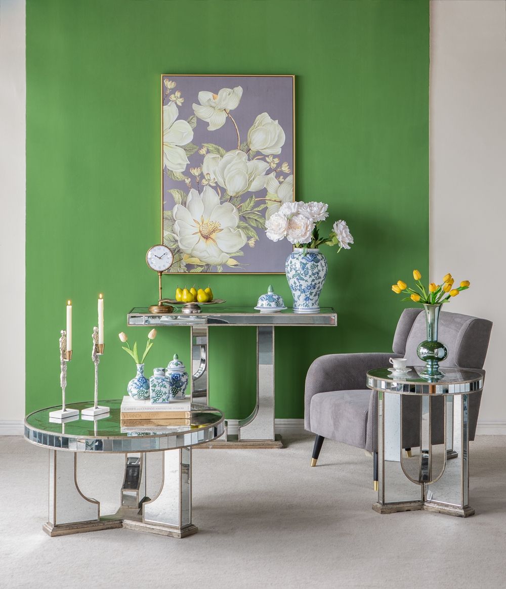 Round Table With Elegant Foral Design And Mirrored