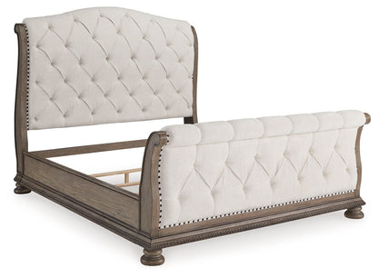 Ardenfield - King Upholstered Sleigh Bed - Light Brown
